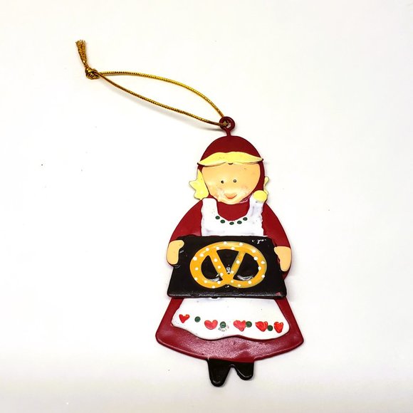 Vintage Tin Christmas Ornament Woman Pretzel Baker Mrs Claus Apron Metal Folk - Picture 1 of 4